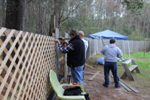 Repairing fencing at the men’s shelter.